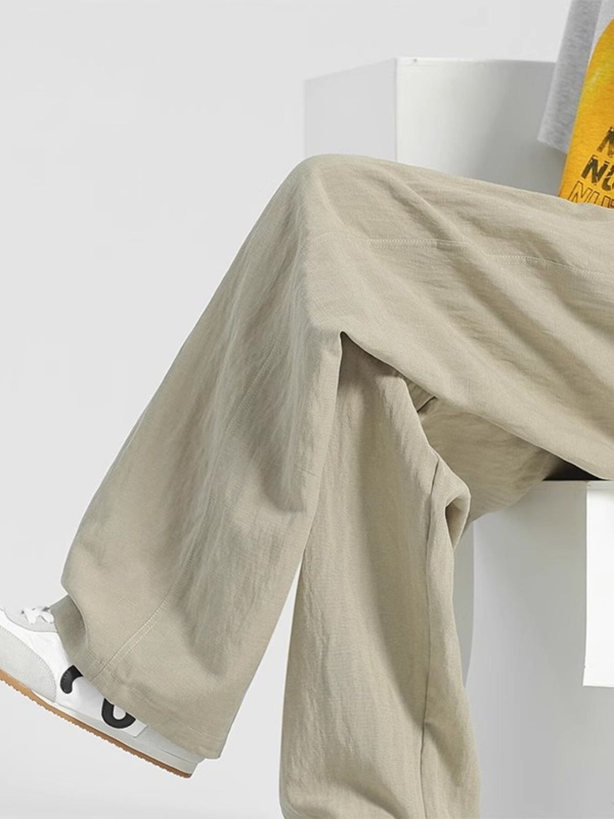 Men's casual loose fit pocket pants by Plush Fashion Hub, featuring comfortable stretch and relaxed style, shown in a neutral color.