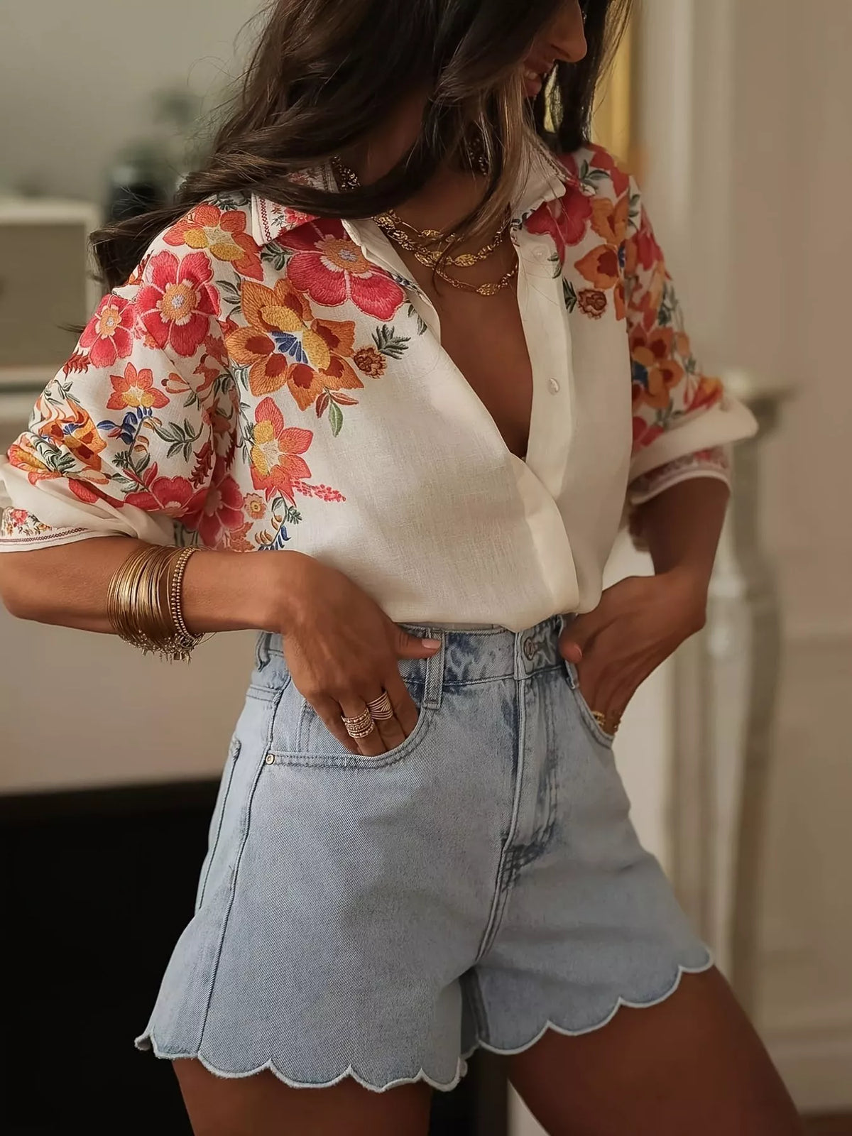 Floral print button-up shirt by Plush Fashion Hub featuring vibrant flower patterns and classic collar design.