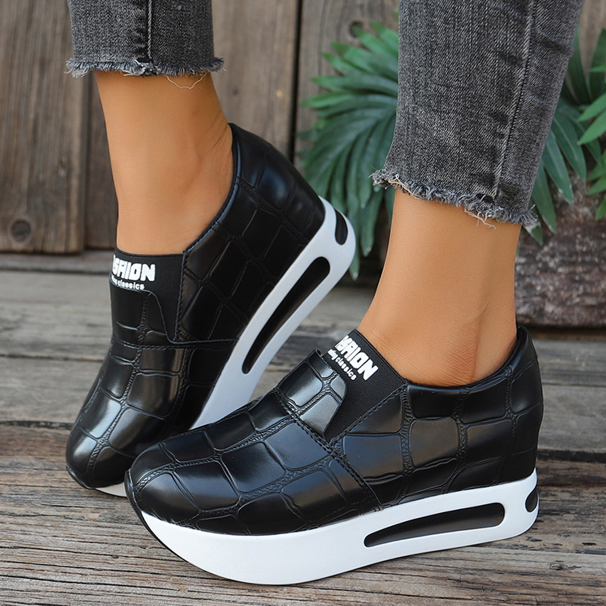 Women's faux leather crocodile pattern platform slip-on sneakers from Plush Fashion Hub, showing stylish design and textured surface.