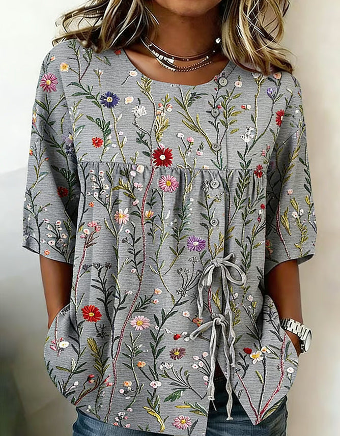 Women's floral 3D print pullover top in loose fit, casualwear from Plush Fashion Hub, featuring colorful floral patterns and a relaxed style.