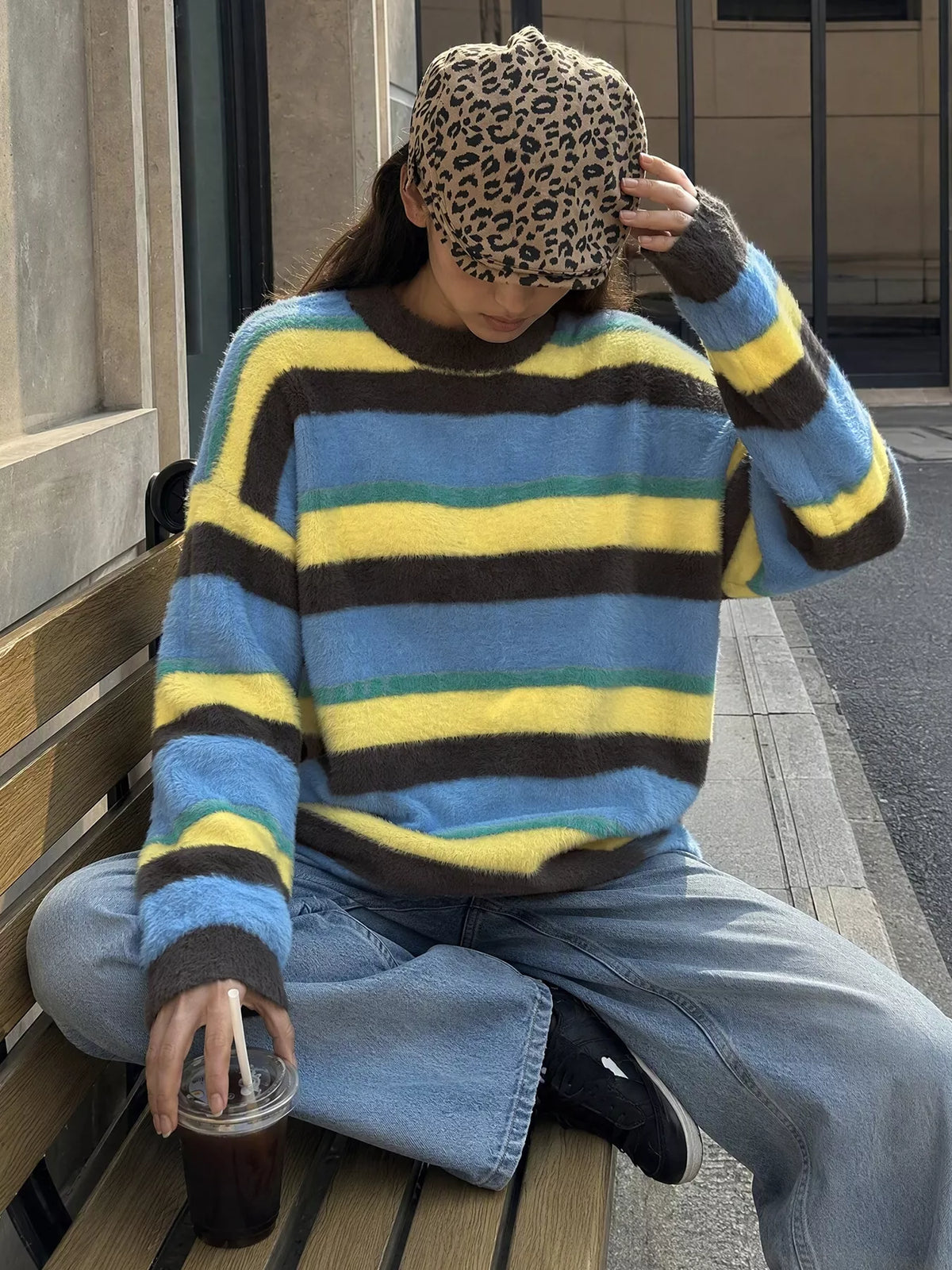 Striped dropped shoulder sweater from Trendsi featuring a cozy knit design with casual, relaxed fit and bold stripe pattern.