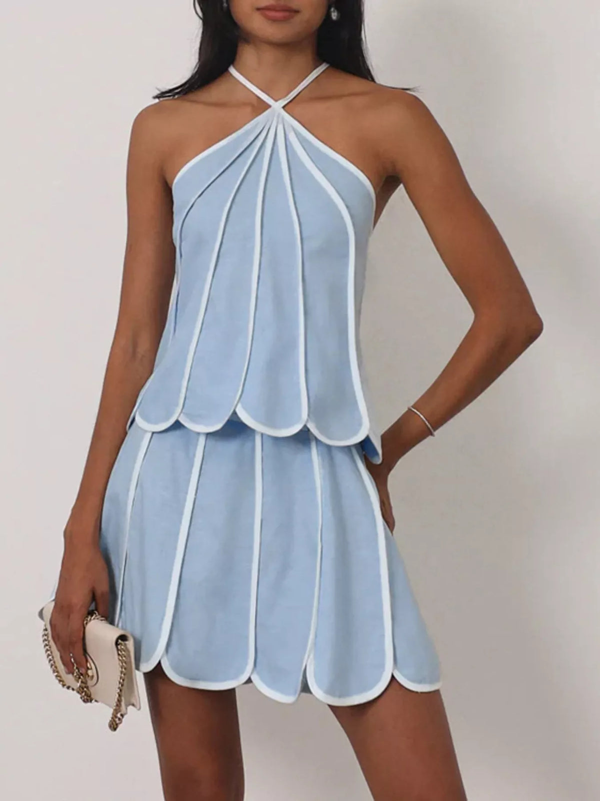 Contrast trim halter neck top and matching skirt set by Plush Fashion Hub, featuring stylish design and coordinated fashion.