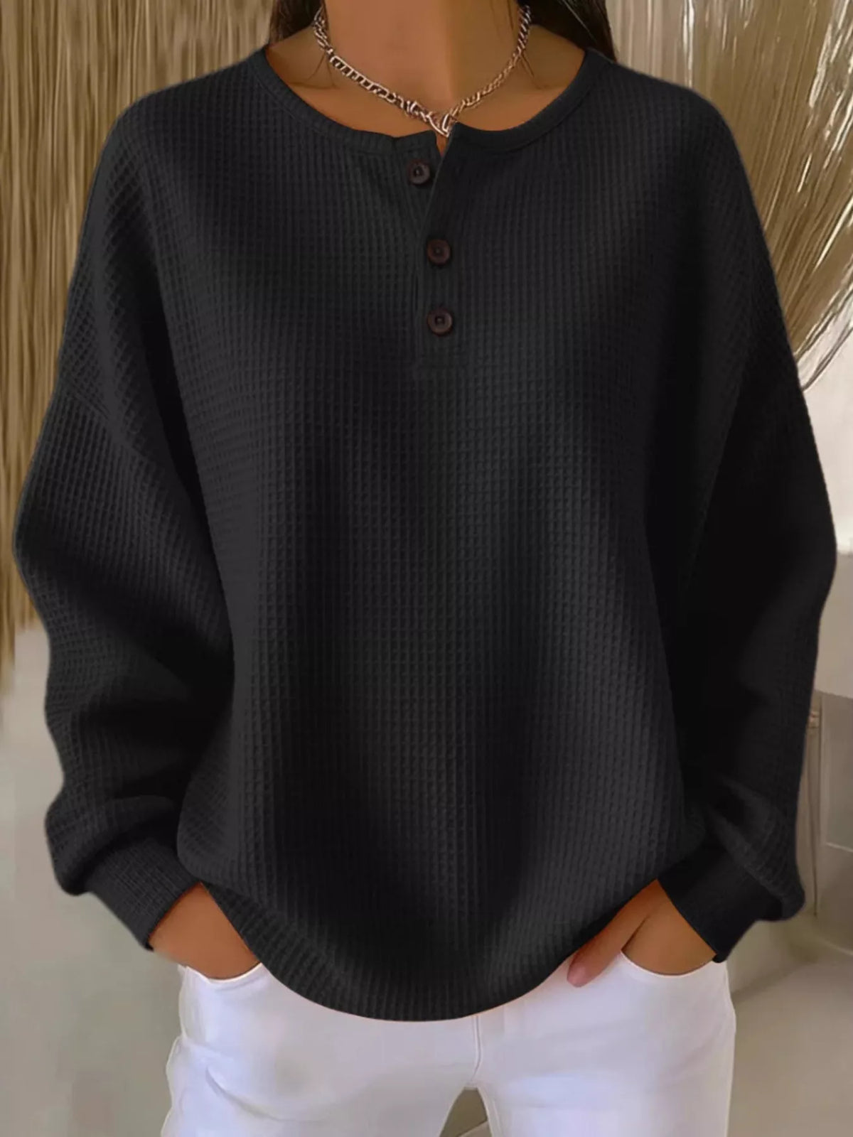 Plus size waffle knit top with button details from Trendsi, featuring a cozy textured fabric and relaxed fit.
