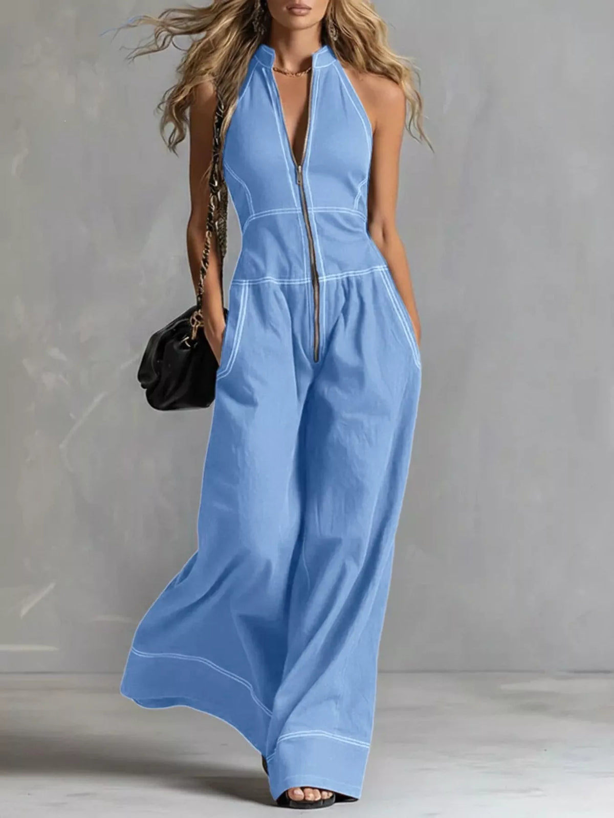 Zip front sleeveless wide-leg jumpsuit from Trendsi, featuring a relaxed fit and stylish design, shown in the product image.