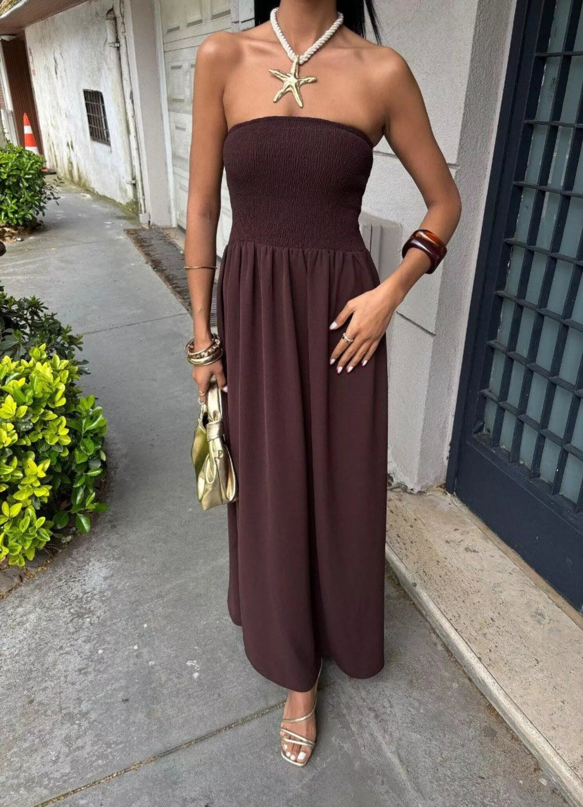 Strapless smocked maxi dress by Plush Fashion Hub featuring a fitted bodice and flowing skirt, perfect for summer occasions.