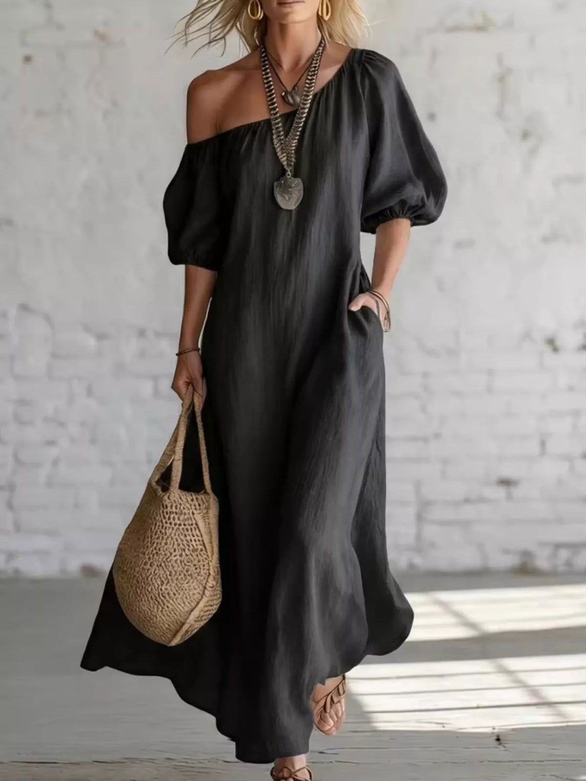 Plush Fashion Hub one-shoulder maxi dress with puff sleeves, elegant and flowing, perfect for formal or special occasions.