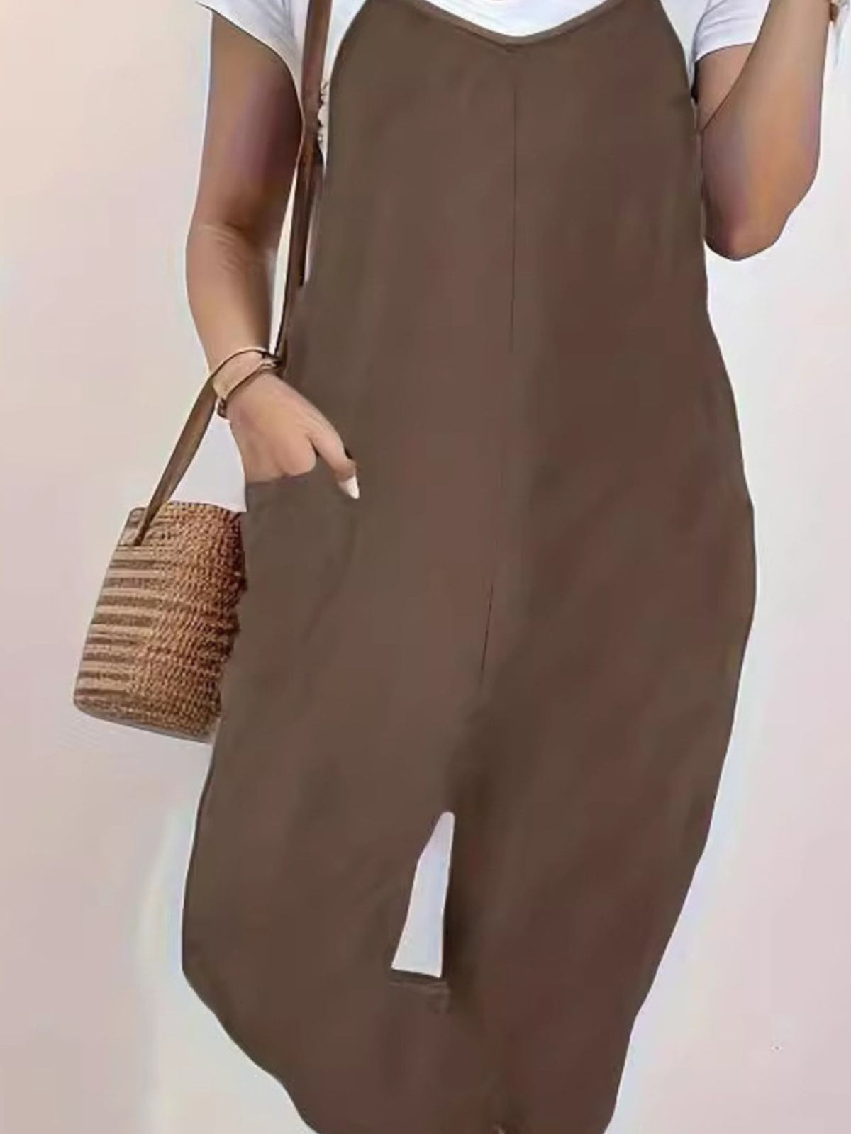 Casual loose fit spaghetti strap jumpsuit by Plush Fashion Hub with pockets, lightweight and comfortable for everyday wear.