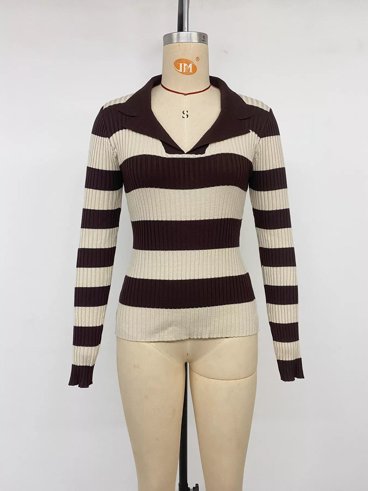 Striped ribbed knit long sleeve sweater shirt by Plush Fashion Hub, featuring a fitted design and stylish pattern.