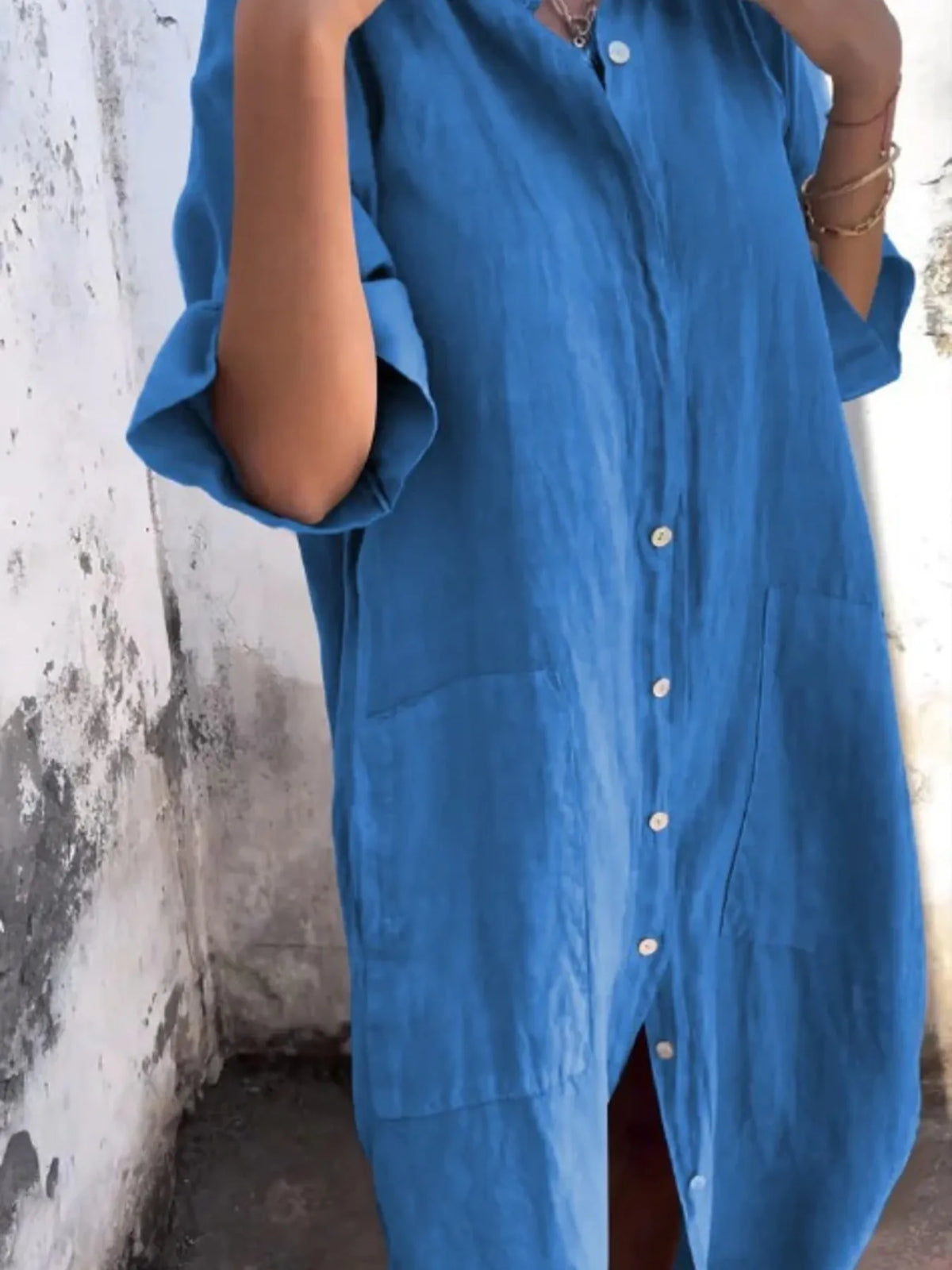 Plus size casual linen button-down shirt dress from Trendsi, featuring a relaxed fit and classic collar in natural linen fabric.