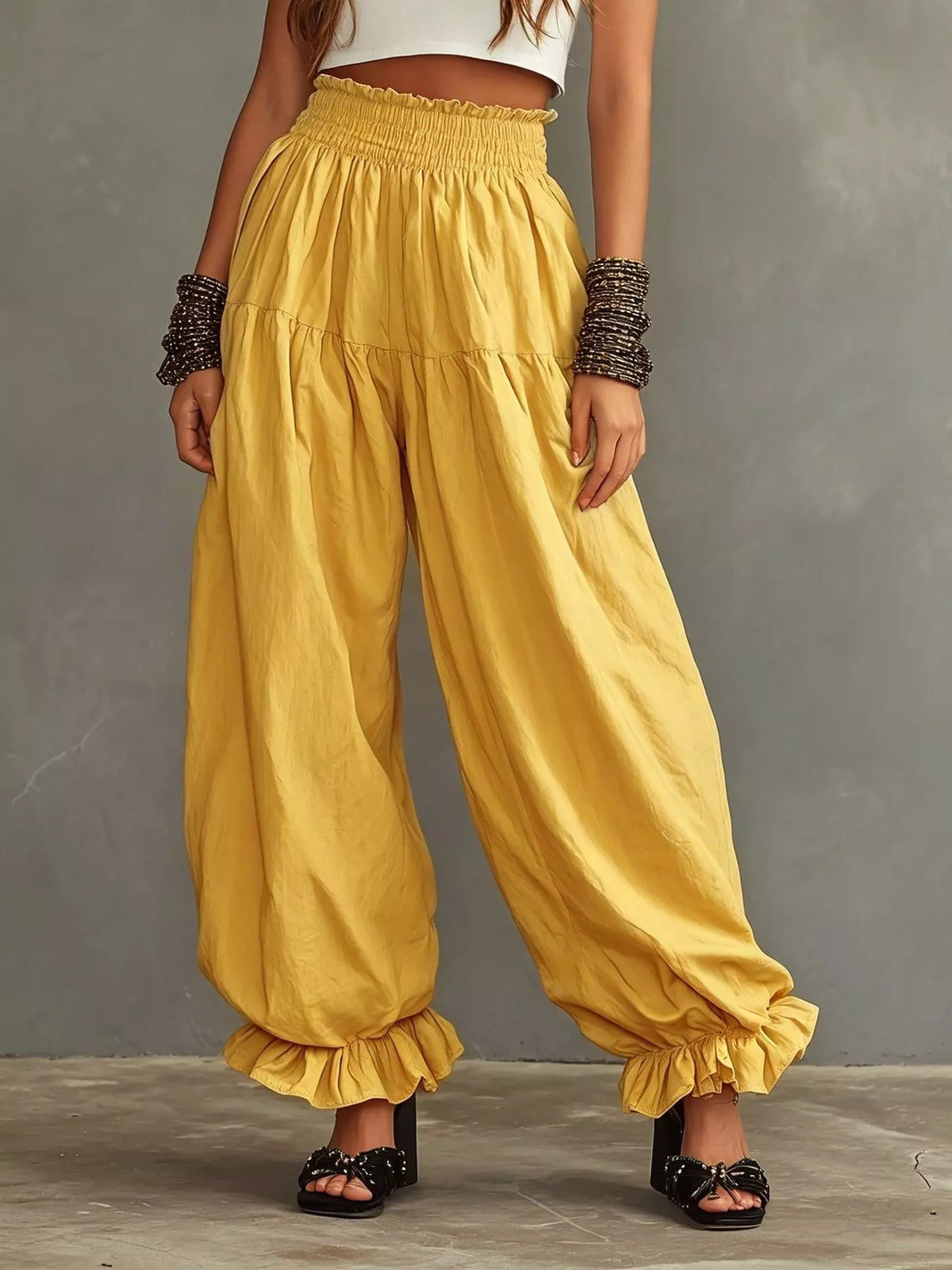 Plus size full smocked ruffle hem wide-leg pants by Plush Fashion Hub, featuring flowy fabric and stylish ruffle details.