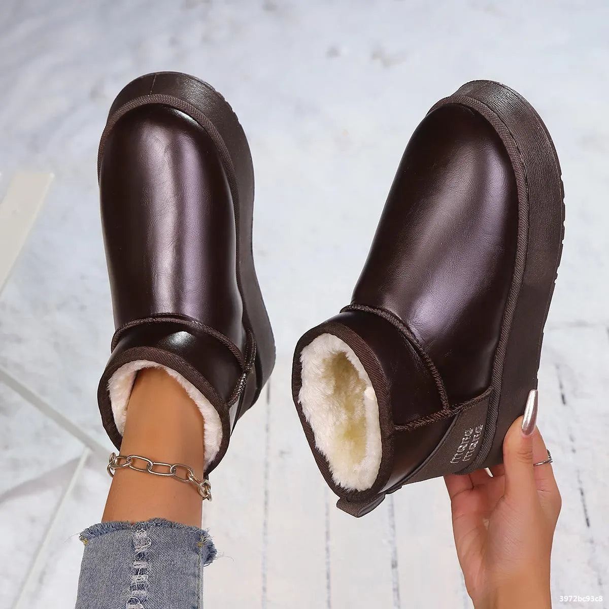 Faux-fur platform ankle boots from Trendsi, featuring a stylish design with chunky soles and cozy fur lining.