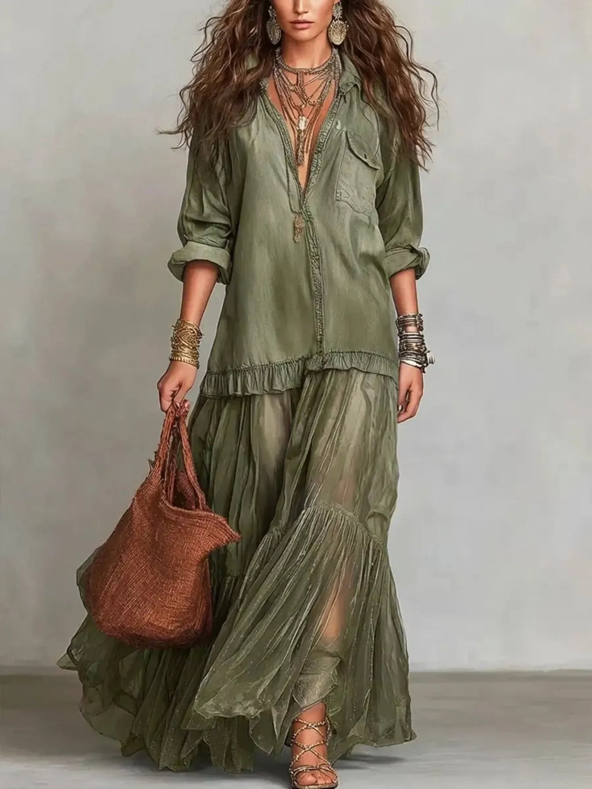 Long sleeve sheer ruffle maxi dress by Plush Fashion Hub with flowing fabric and elegant ruffle details.