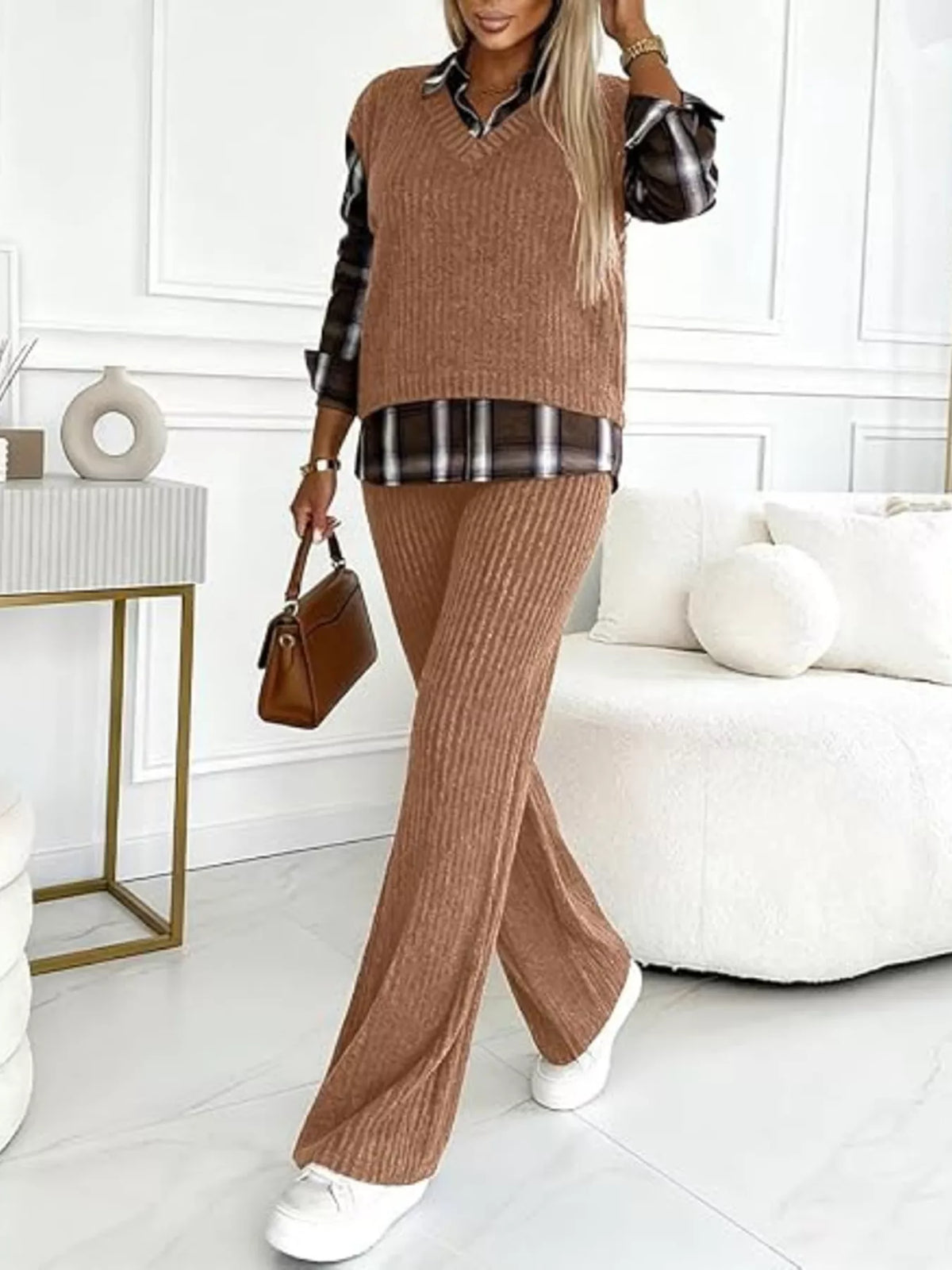Ribbed knit plaid sleeve top and pants set by Trendsi, featuring a cozy, stylish matching outfit with ribbed fabric and plaid accents.