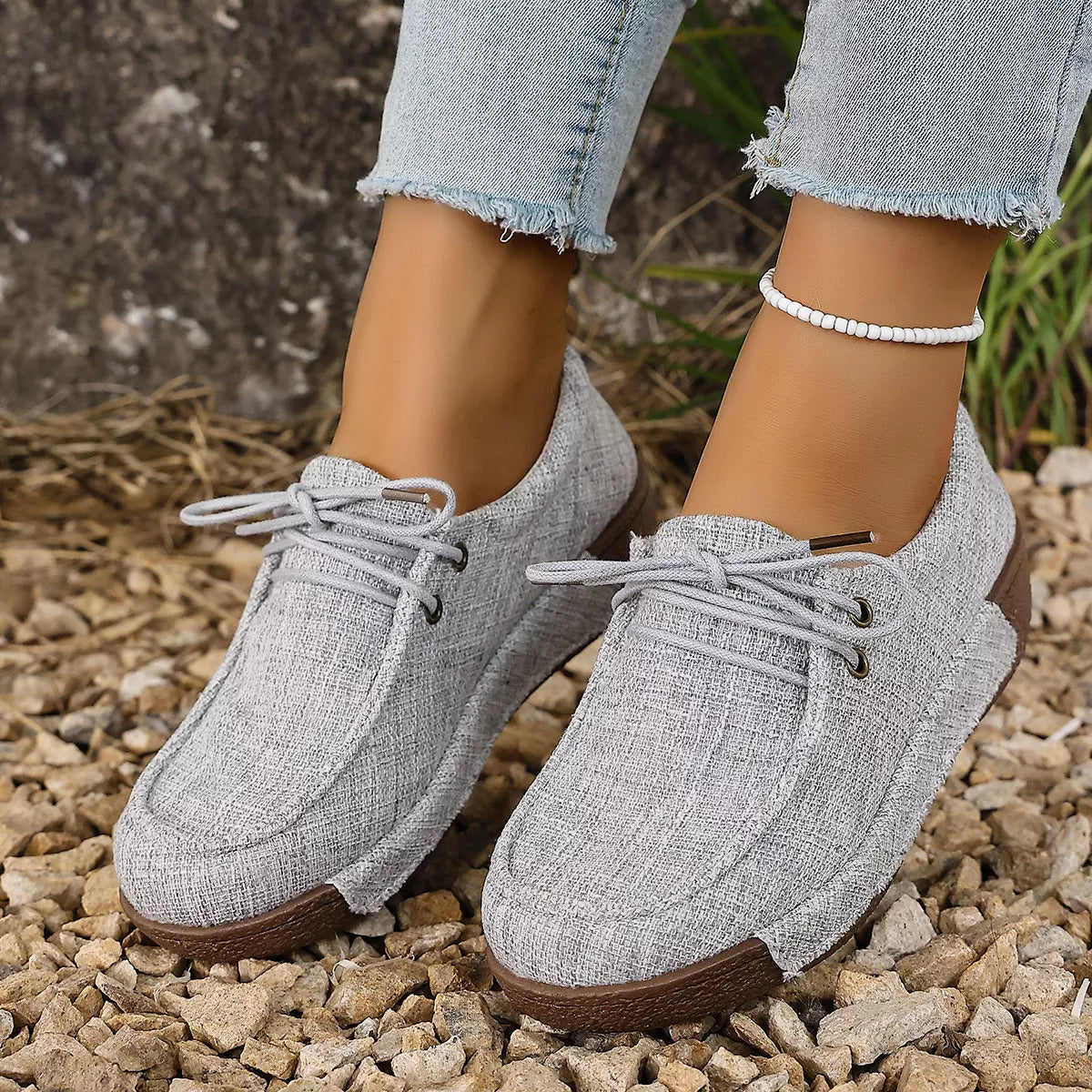 Round toe lace-up sneakers from Trendsi, stylish footwear with a classic design, perfect for casual and everyday wear.