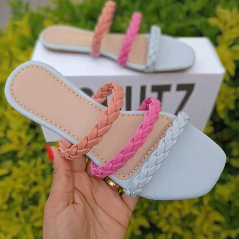 Plus size LadyShow.Store flat woven hollow slippers, women's beach sandals in matching colors, showcasing lightweight woven design.