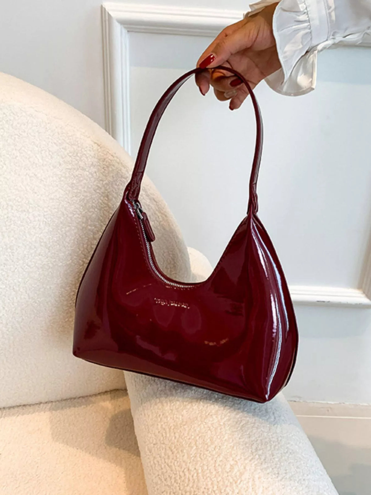 Trendsi PU leather shoulder handbag with sleek design, featuring a spacious interior and stylish adjustable strap.
