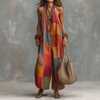 Women's plaid print jumpsuit by Plush Fashion Hub featuring sleeveless design, wide-leg style, and suspender straps.