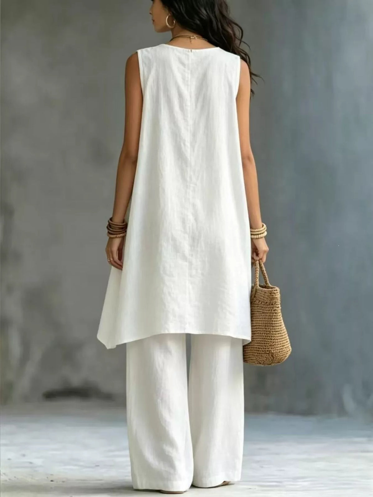 Plush Fashion Hub sleeveless asymmetrical top and wide-leg pants set, stylish and comfortable fashion ensemble, front view.