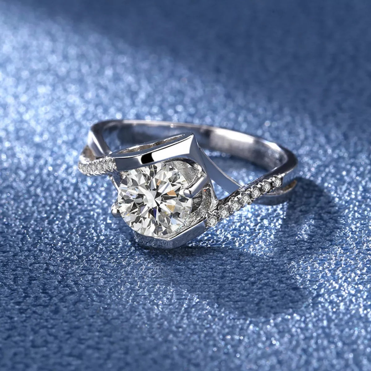 Sterling silver 1 carat moissanite ring with a sparkling solitaire gemstone, elegant and stylish jewelry piece.