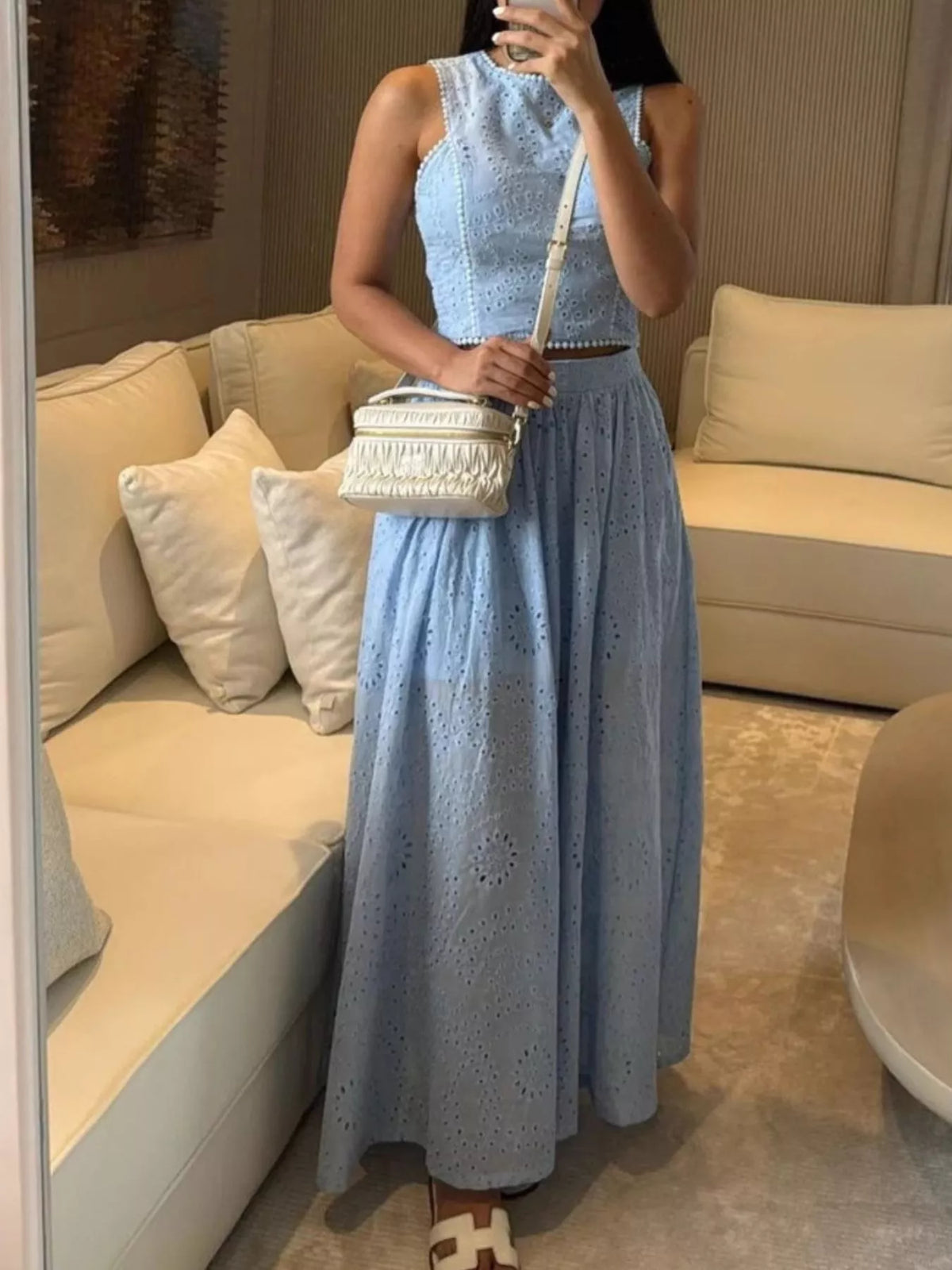 Plush Fashion Hub eyelet crop top and maxi skirt set featuring a stylish crop top and flowing skirt with eyelet details.