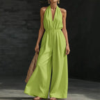 Women’s V-neck halter neck wide-leg jumpsuit by FitiqueFit, casualwear style, shown in a relaxed fit with flowing wide-leg pants.
