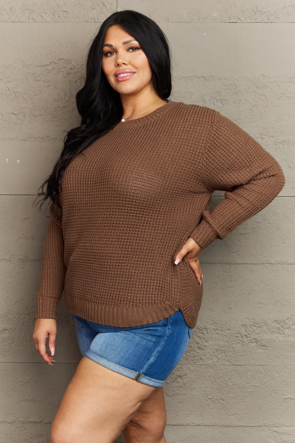 Plus size Zenana waffle knit sweater with high-low hem, breezy design, and cozy texture, perfect for casual wear.