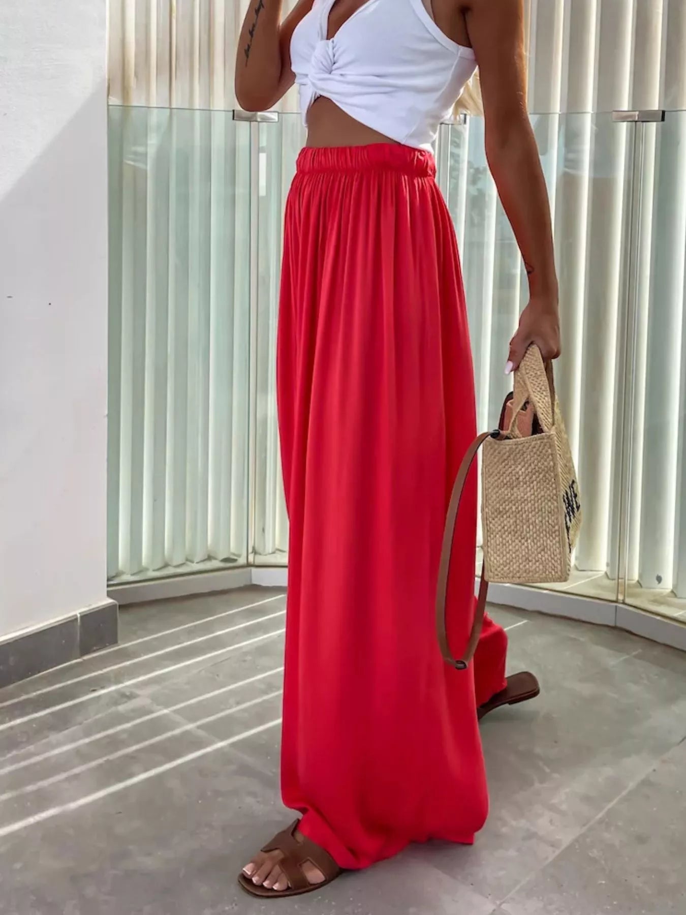 Flowy wide-leg pants from Trendsi featuring a relaxed fit, lightweight fabric, and a stylish, breezy silhouette.