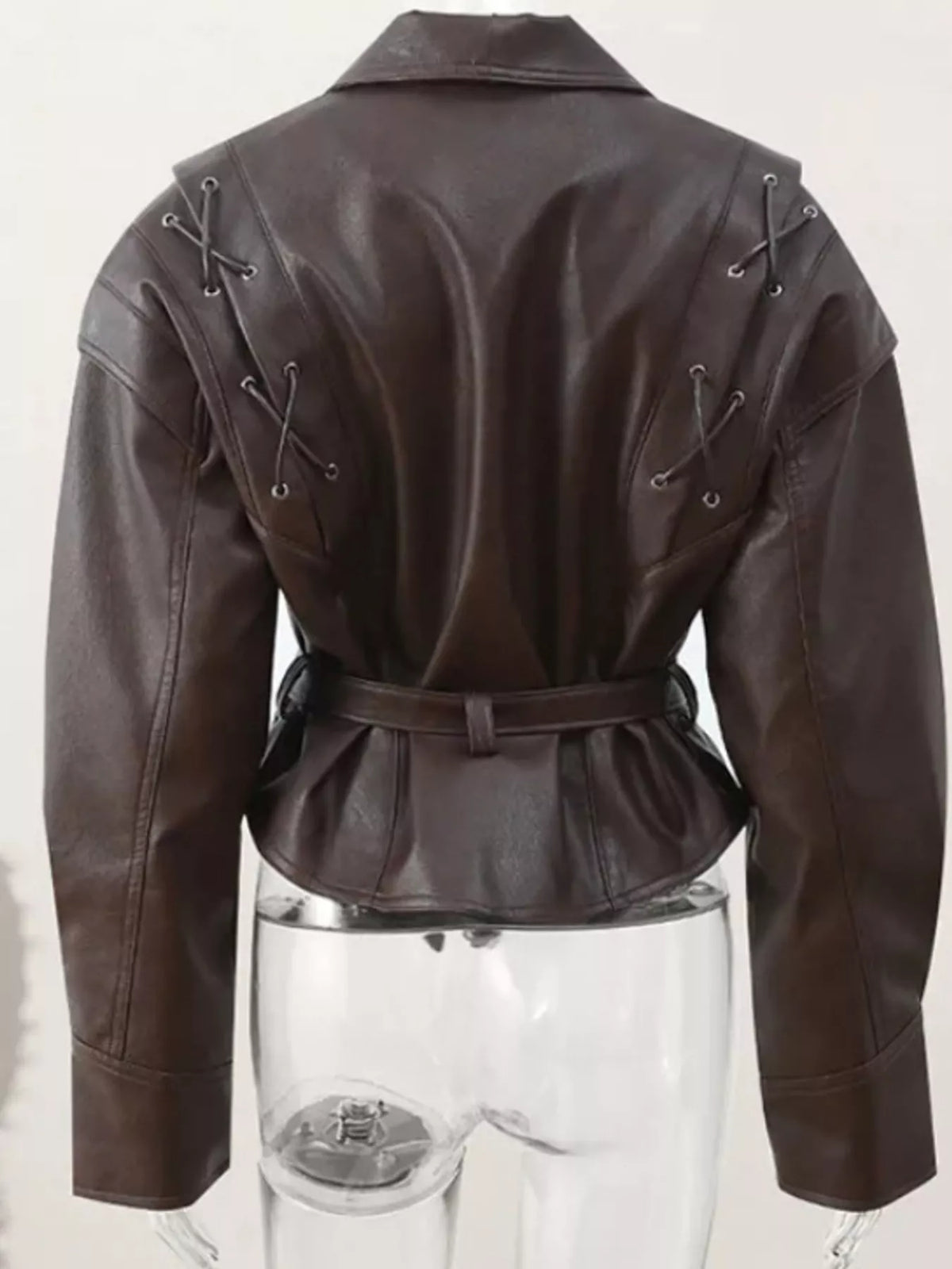 Women's leather belted jacket with shawl collar, stylish outerwear from Trendsi featuring a sleek design and classic silhouette.