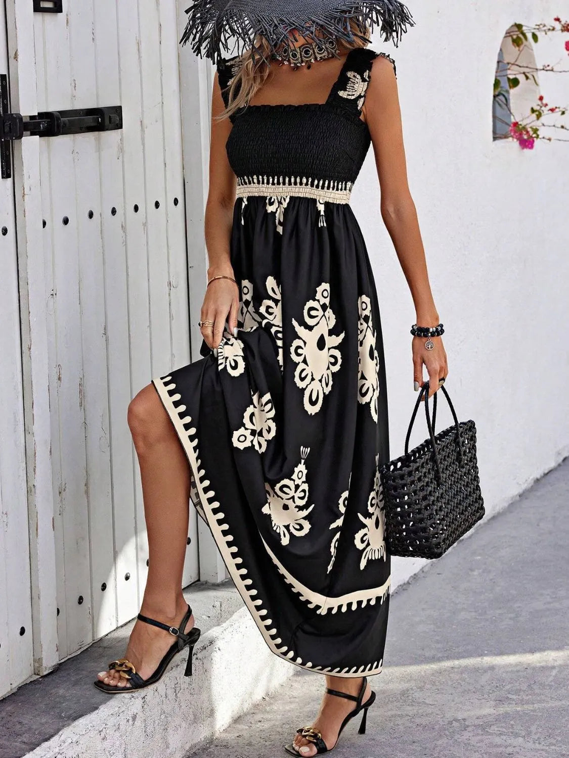 Plush Fashion Hub smocked printed wide strap maxi dress with a flowing silhouette and vibrant floral pattern.