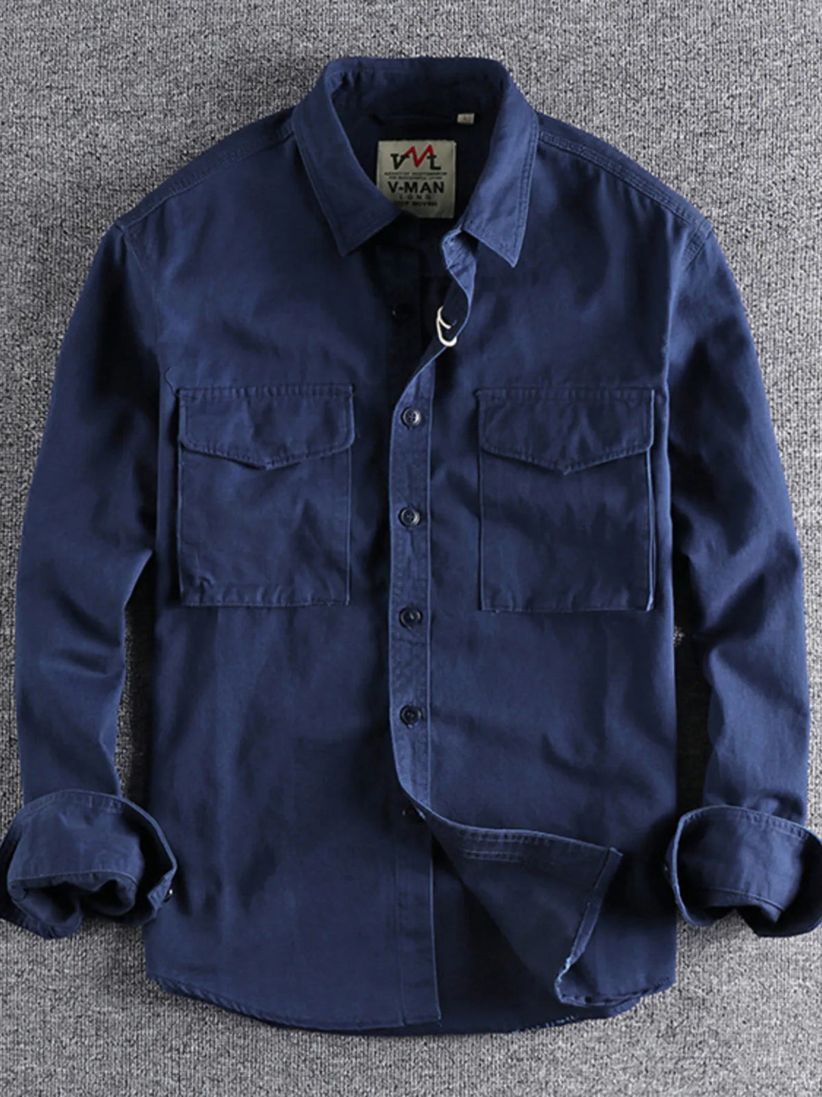 Men's plus size button-up shirt with chest pockets by Trendsi, casual men's shirt in a comfortable fit, shown in navy blue.