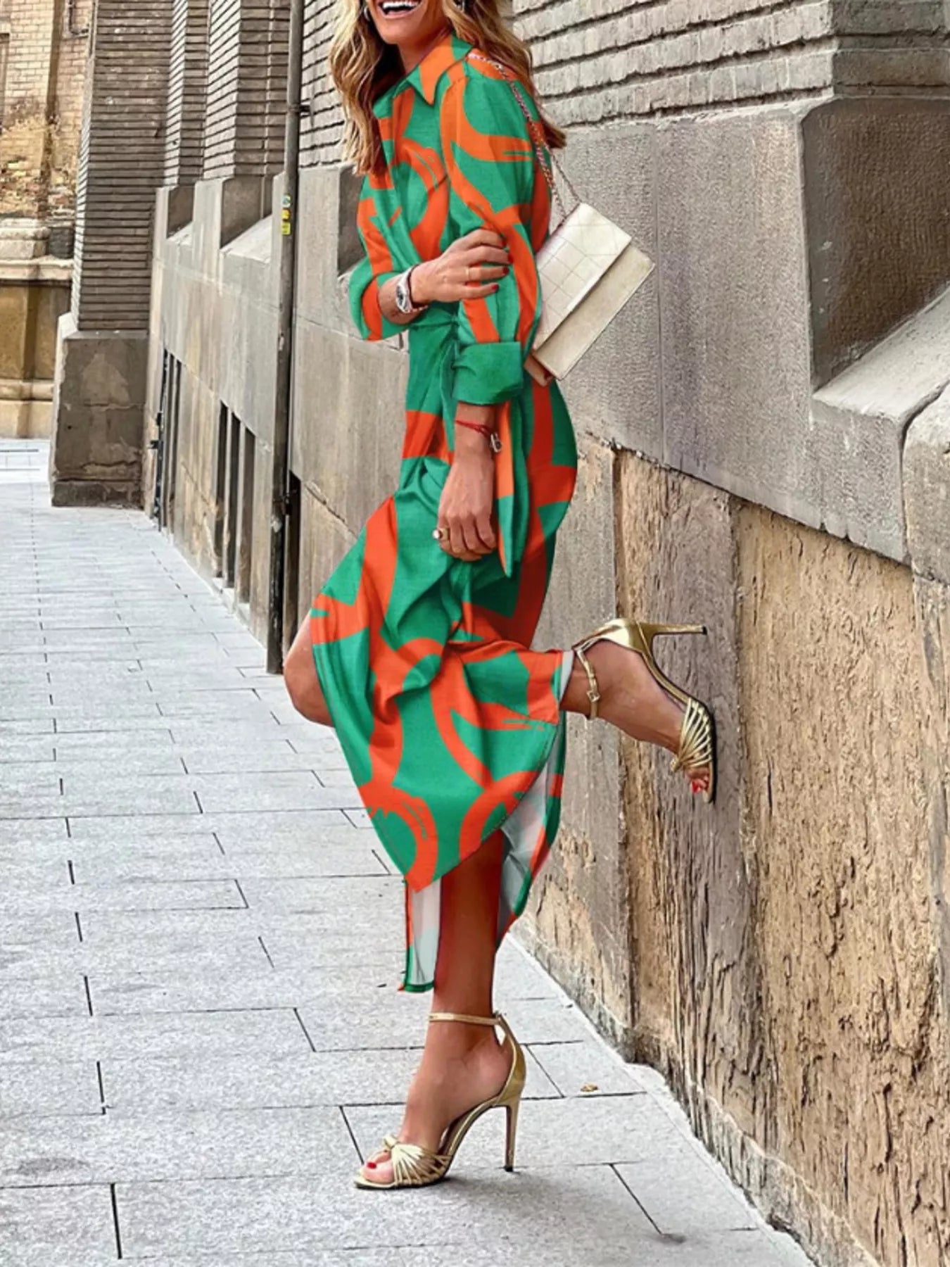 Printed collared neck shirt dress from Trendsi, featuring a stylish design, long sleeves, and a classic button-front style.