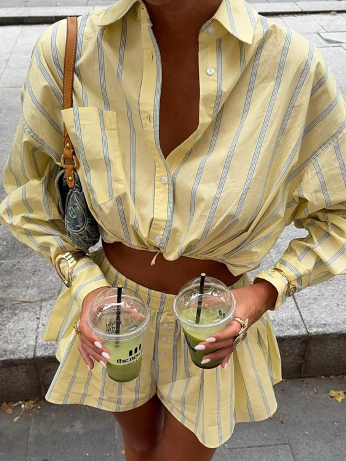 Striped button-up shirt and shorts loungewear set by Plush Fashion Hub, casual and comfortable for relaxing at home.