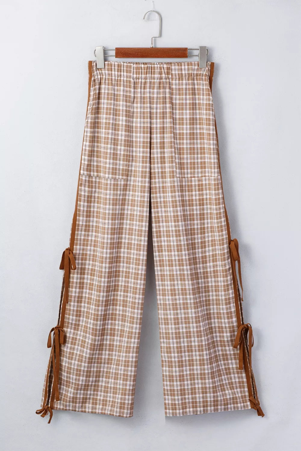 Casual plaid print pants by Trendsi featuring tie detail, relaxed fit, and comfortable fabric, perfect for everyday wear.