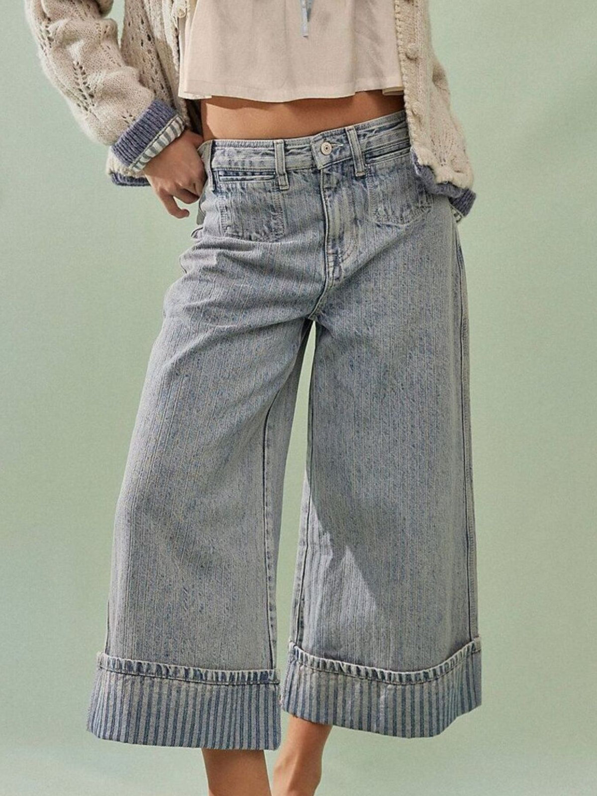Plush Fashion Hub wide-leg cropped denim jeans shown on a model, featuring a relaxed fit and classic blue denim fabric.