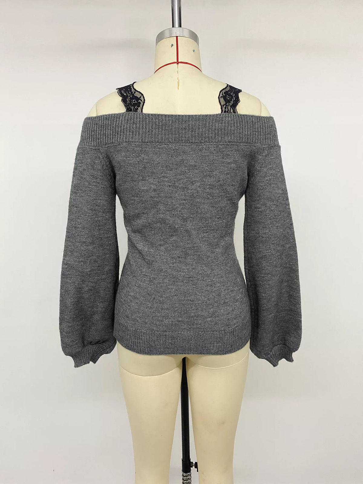 Off-shoulder lace trim sweater by Plush Fashion Hub, featuring a cozy knit design with delicate lace accents for stylish comfort.