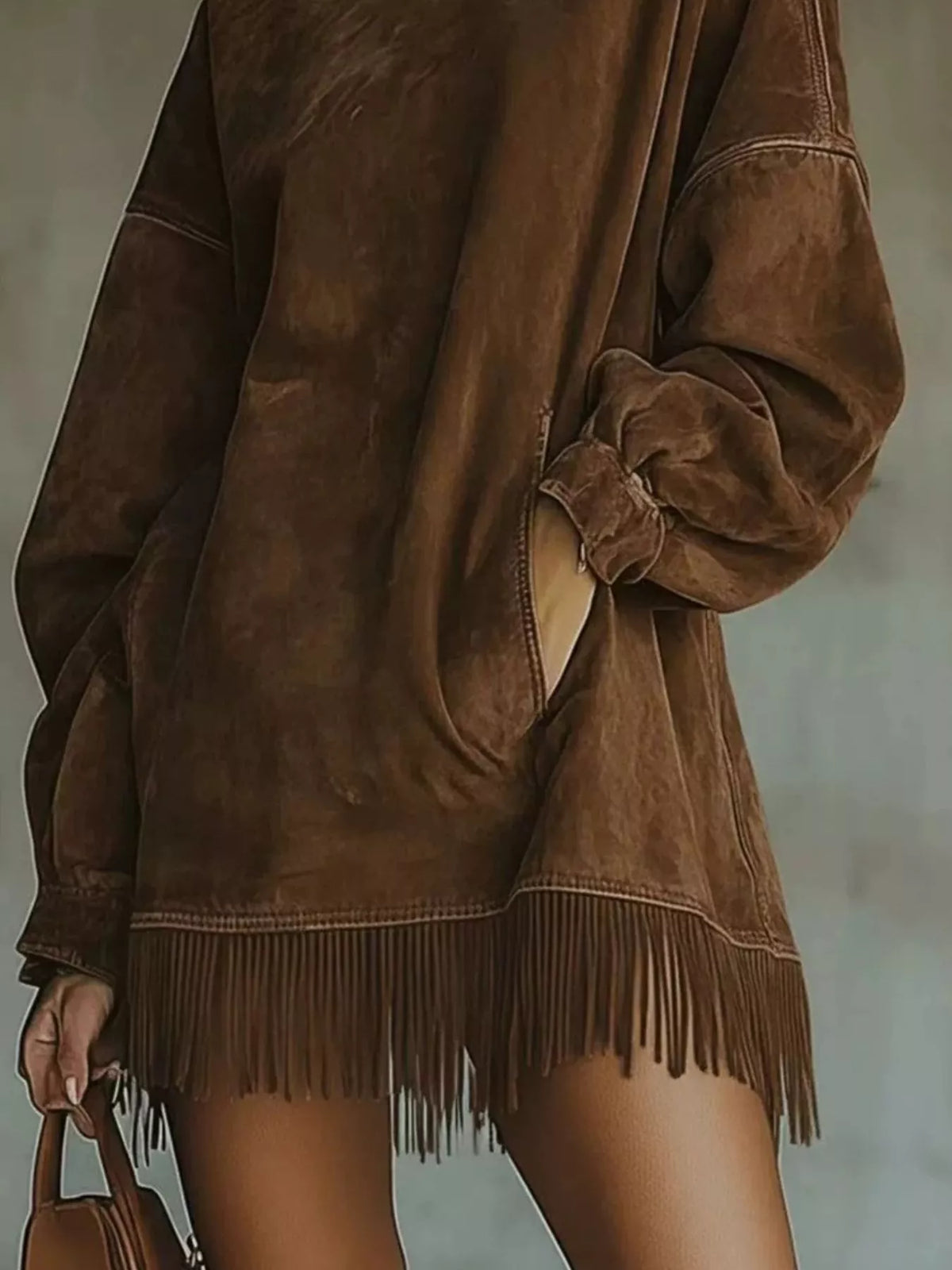 Plus size long sleeve mini dress with mock neck and fringed hem, from Trendsi, featuring a sweater-style design.