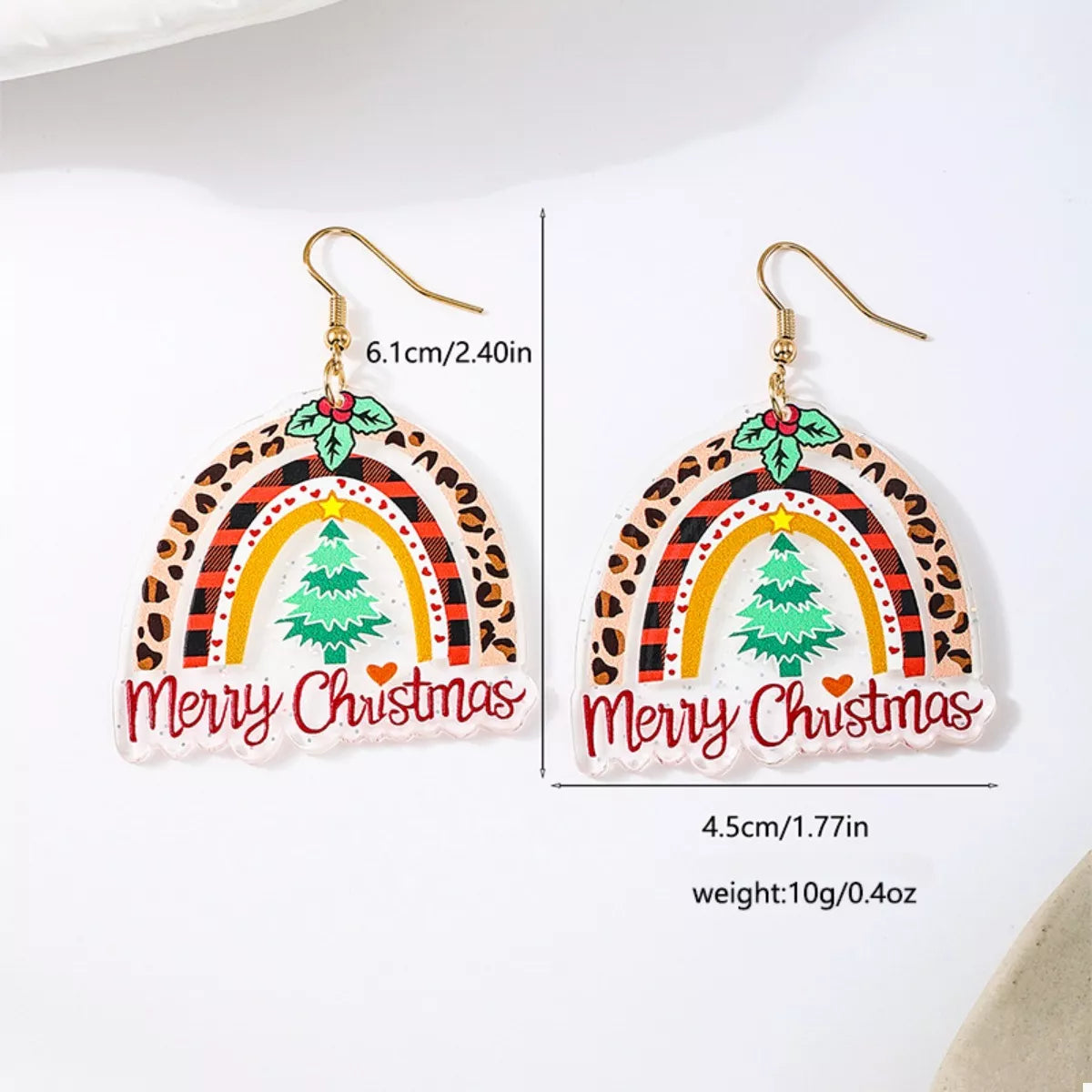 Colorful Christmas rainbow dangle earrings from Plush Fashion Hub featuring festive holiday-themed jewelry in vibrant rainbow colors.