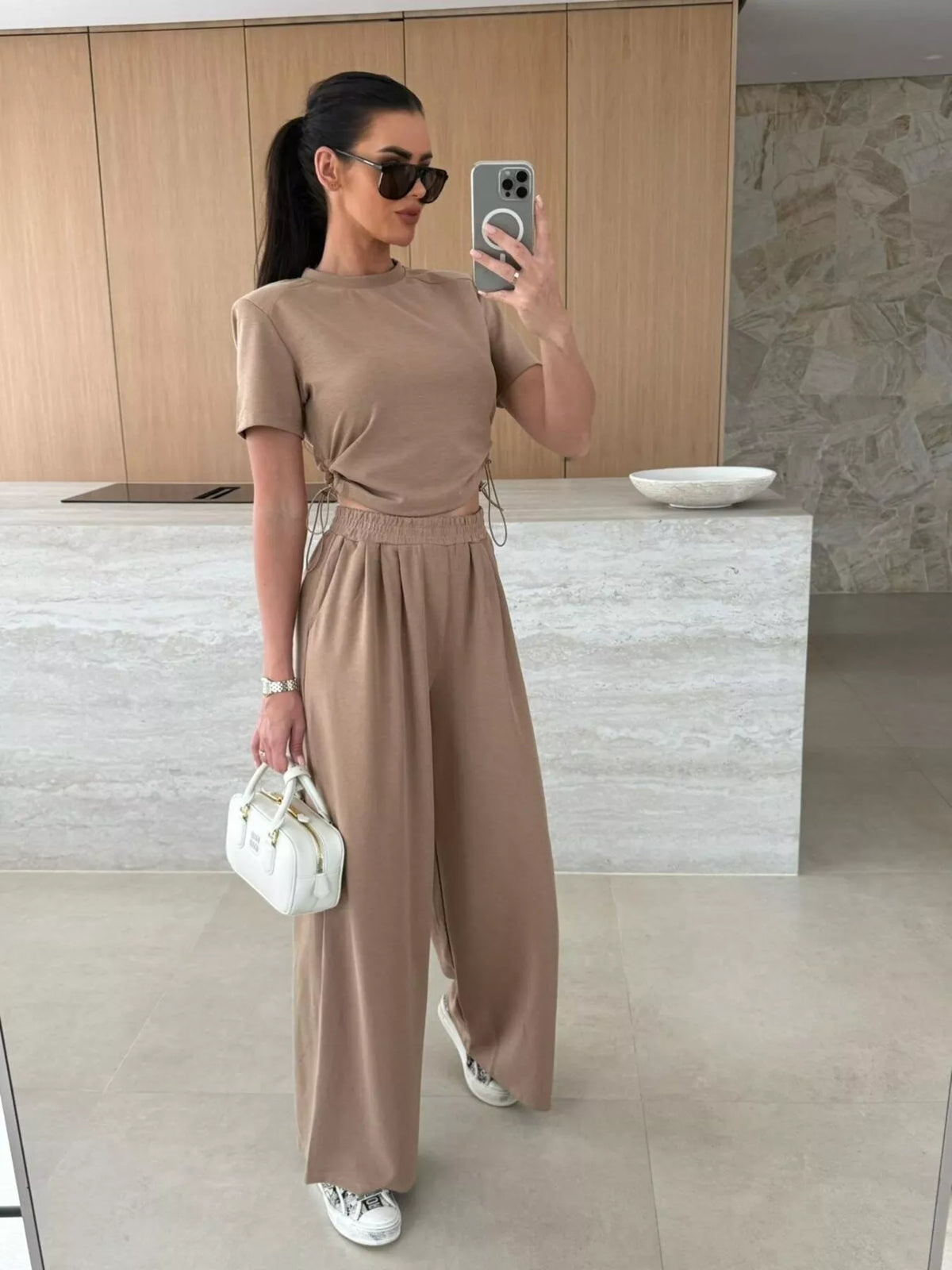 Drawstring crop top and wide-leg pants set by Plush Fashion Hub, featuring a stylish matching two-piece outfit.