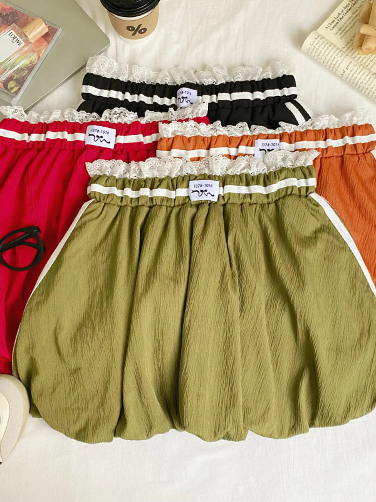 Plush Fashion Hub lace trim elastic waist mini skirt featuring a stylish design and comfortable fit, shown in a side view.