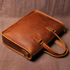 Pi-Mart men's Crazy Horse leather briefcase for laptop, featuring sturdy handles and a classic design for professional use.