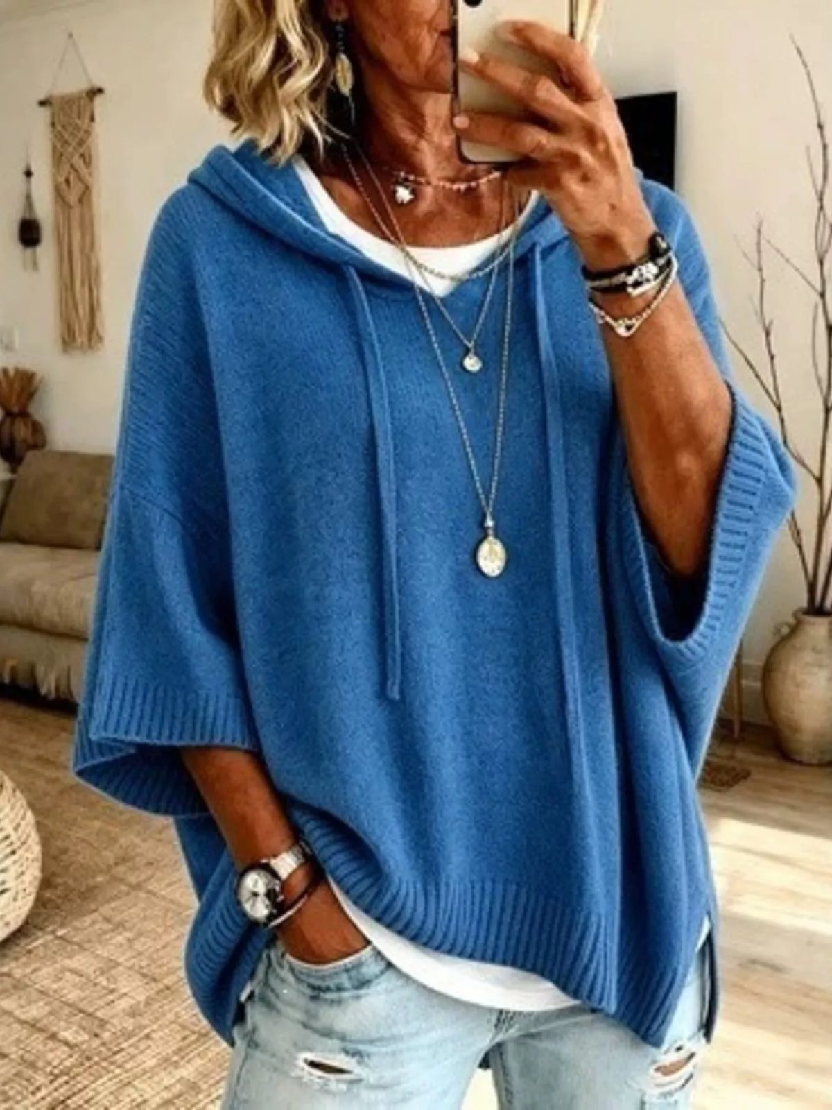 Plus size full-zip hoodie sweater with drawstring and 3/4 sleeves, from Trendsi, shown on a mannequin.