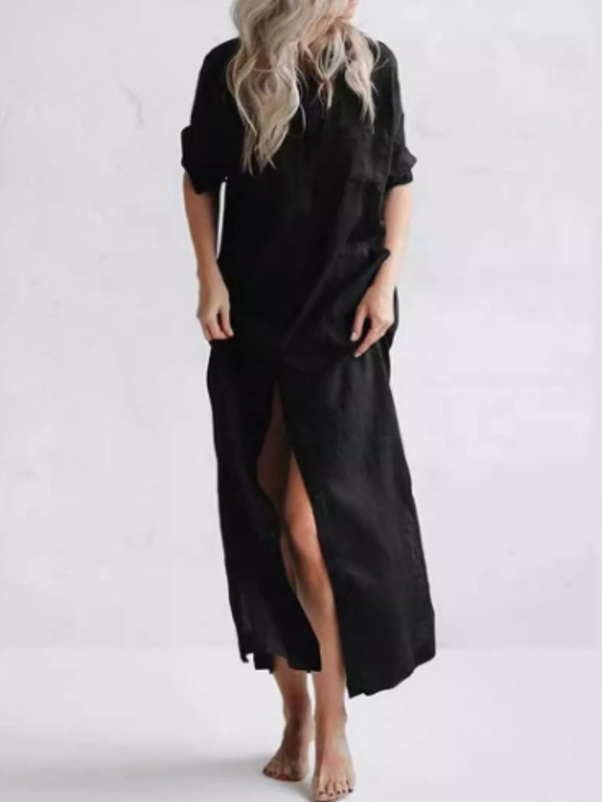 Plus size casual button-down maxi dress by Trendsi, featuring a relaxed fit and full-length design in soft fabric.