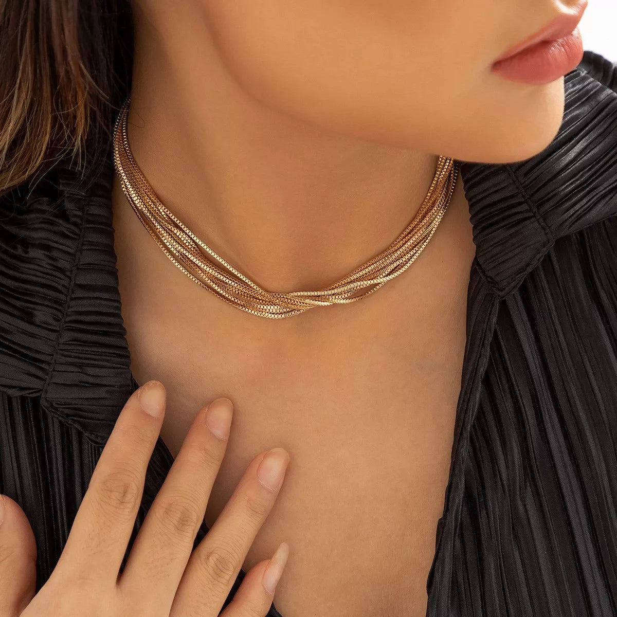 Multi-layered adjustable necklace from Plush Fashion Hub featuring delicate chains and versatile style.