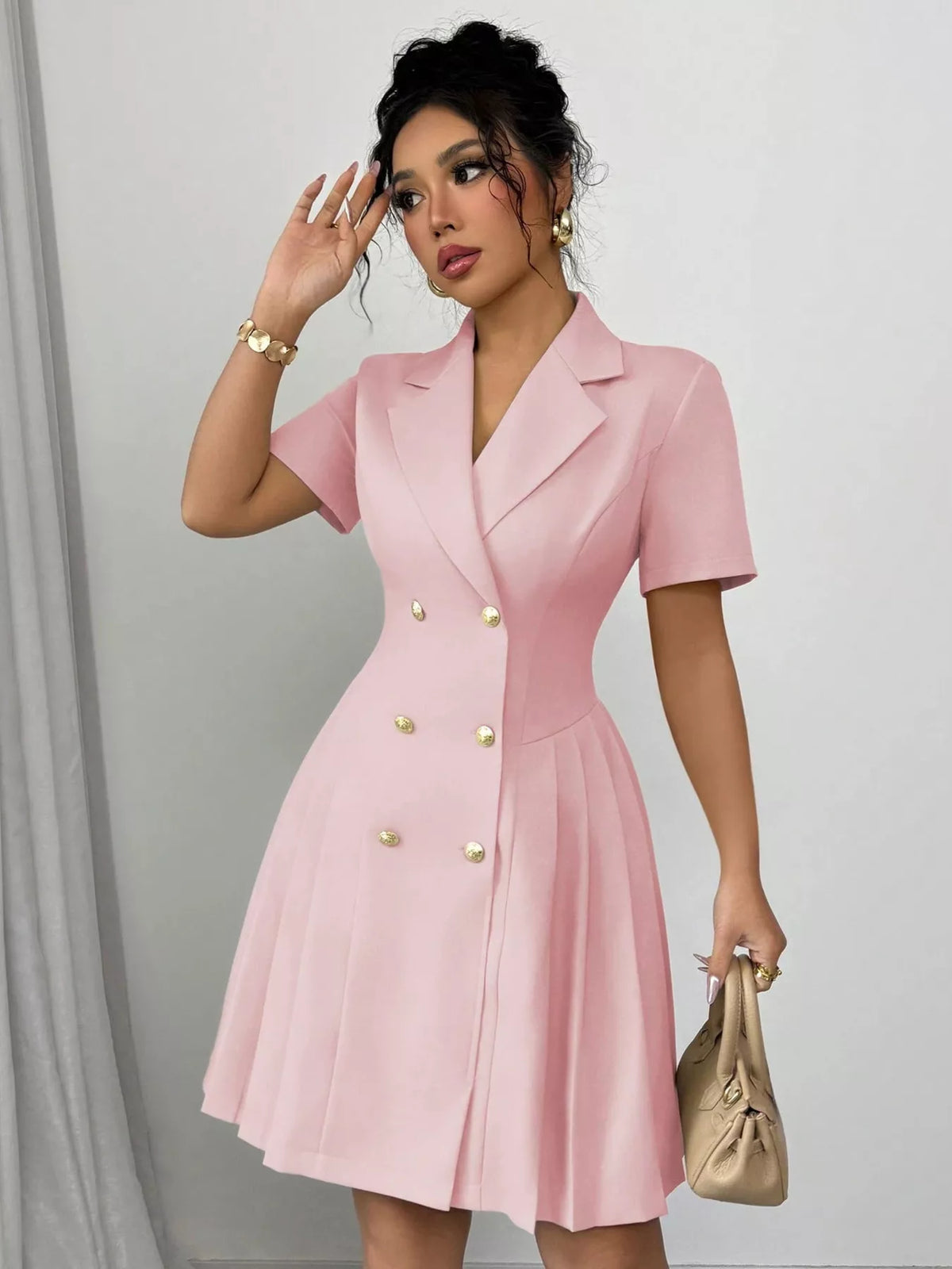 Plush Fashion Hub double-breasted pleated blazer dress with structured collar and tailored fit, shown on a hanger.