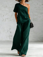 Women's wide-leg pants and top set by FitiqueFit, casualwear with three-quarter sleeves, stylish two-piece outfit.