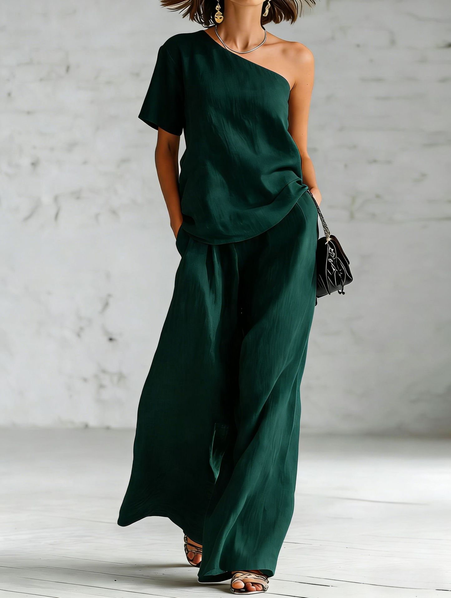 Women's wide-leg pants and top set by FitiqueFit, casualwear with three-quarter sleeves, stylish two-piece outfit.