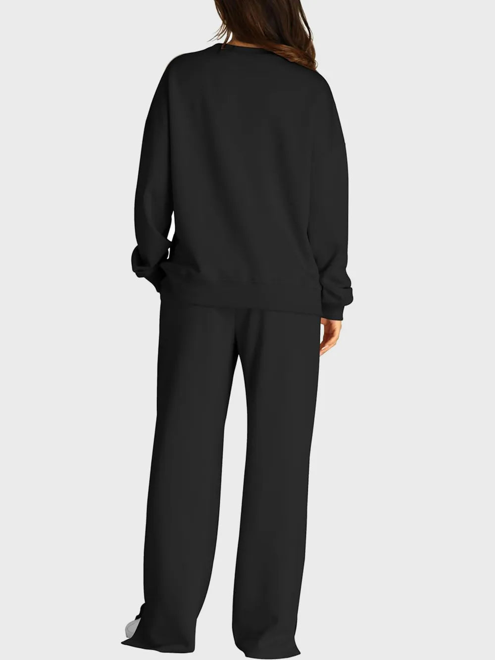 Trendsi round neck long sleeve top paired with stylish slit pants set, featuring a comfortable fit and modern design.