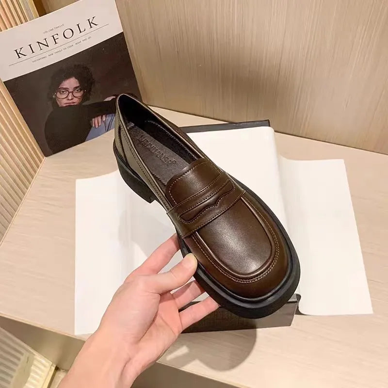 Women's round toe platform loafers by Trendsi, stylish and comfortable shoes with a classic design and chunky sole.