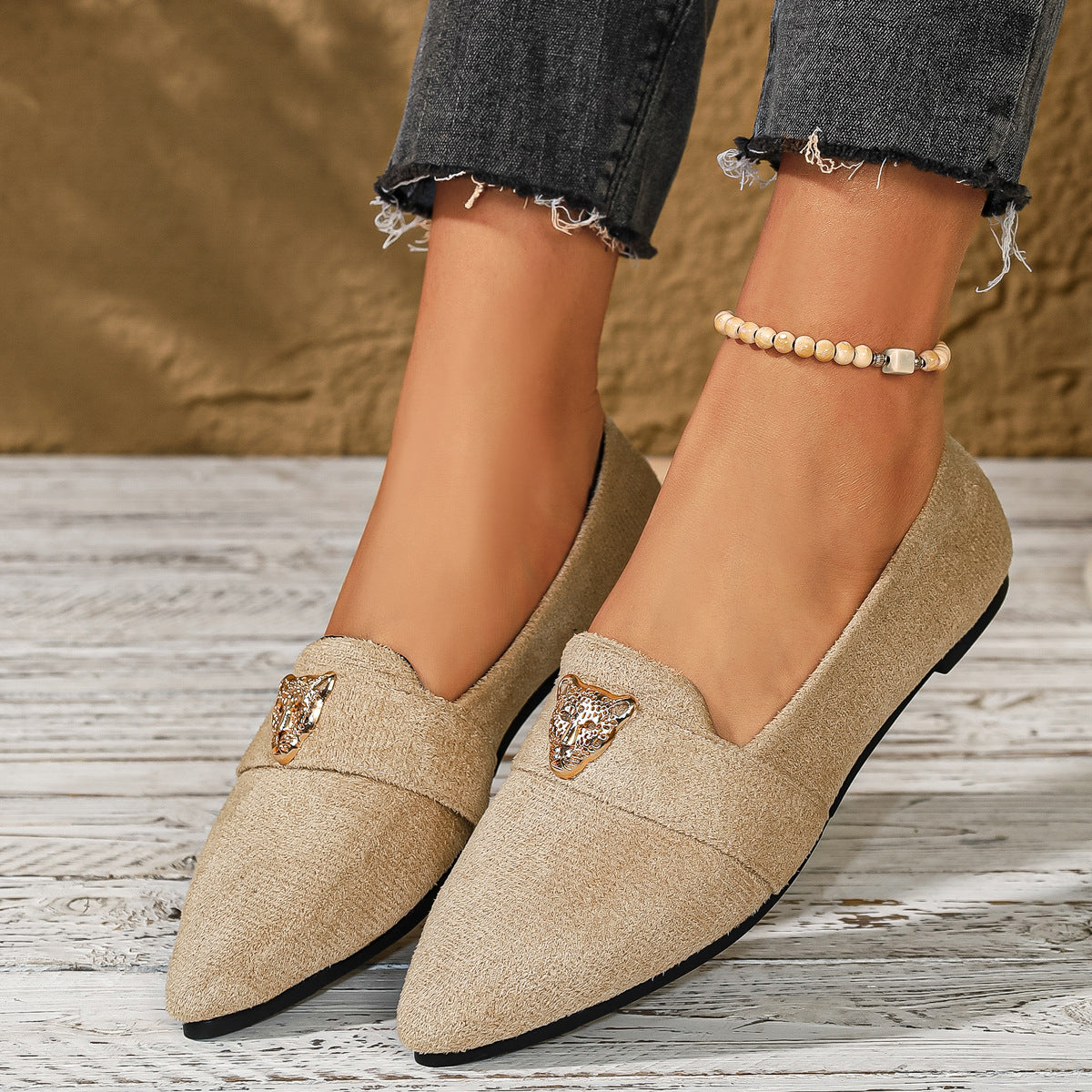Point toe slip-on footwear by Trendsi featuring a sleek design and comfortable fit, perfect for stylish everyday wear.