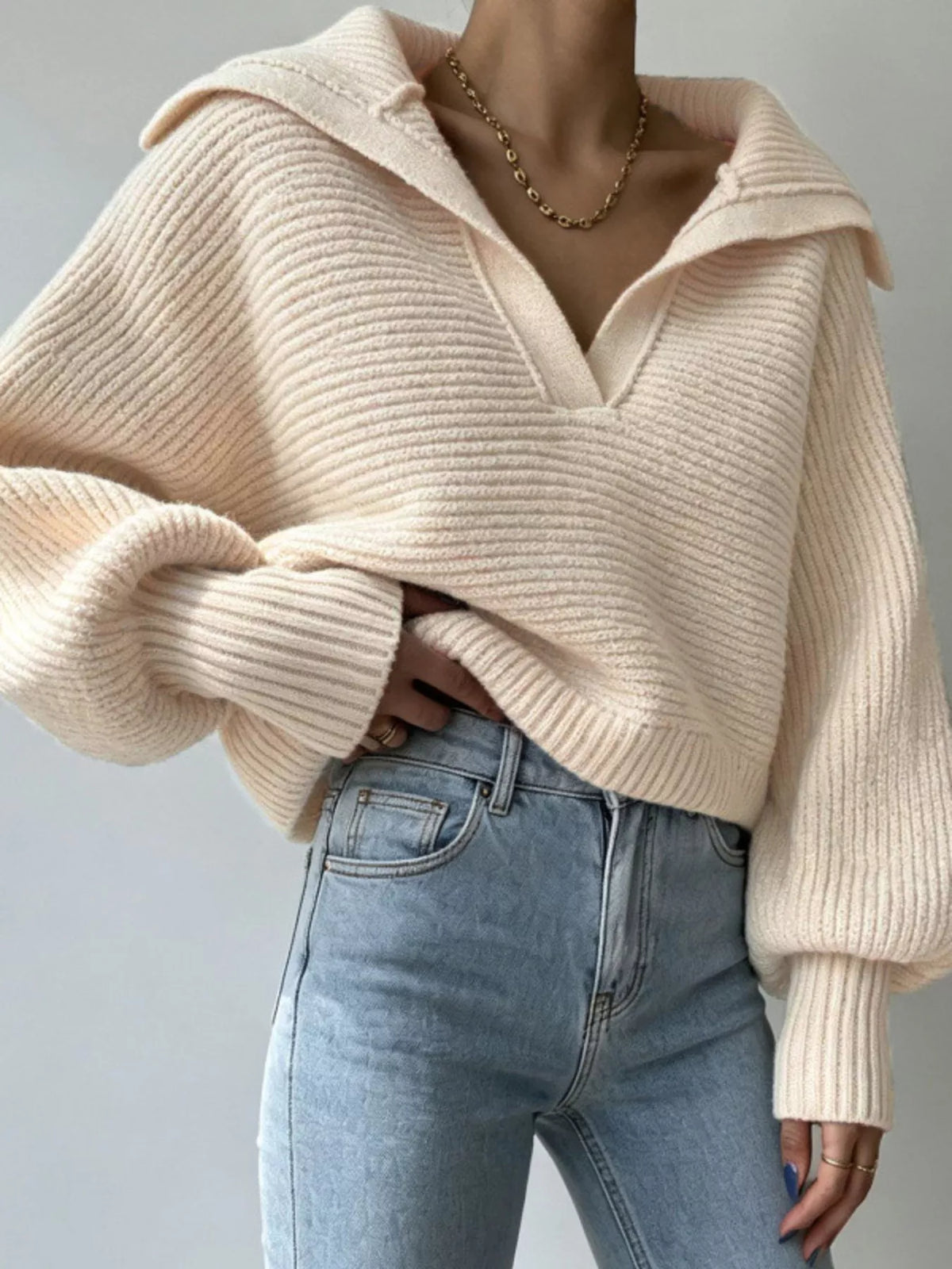 Trendsi women's ribbed cropped sweater featuring an oversized collar, soft knit fabric, and stylish relaxed fit.